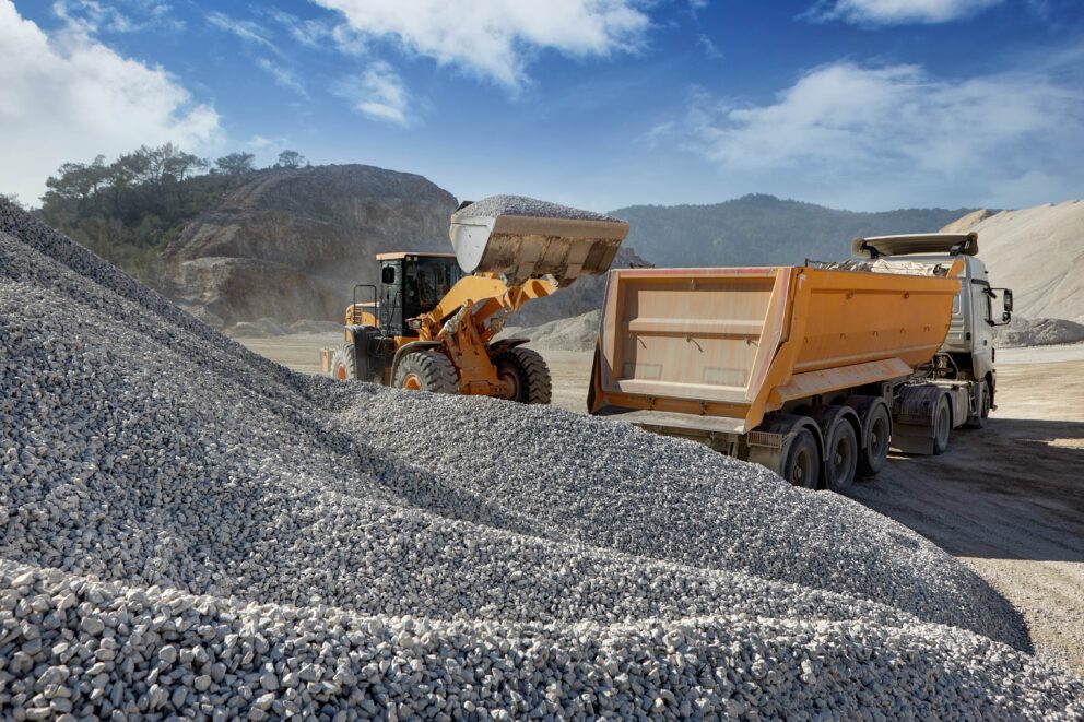 Wheel,Loader,Loads,A,Truck,With,Sand,In,A,Gravel